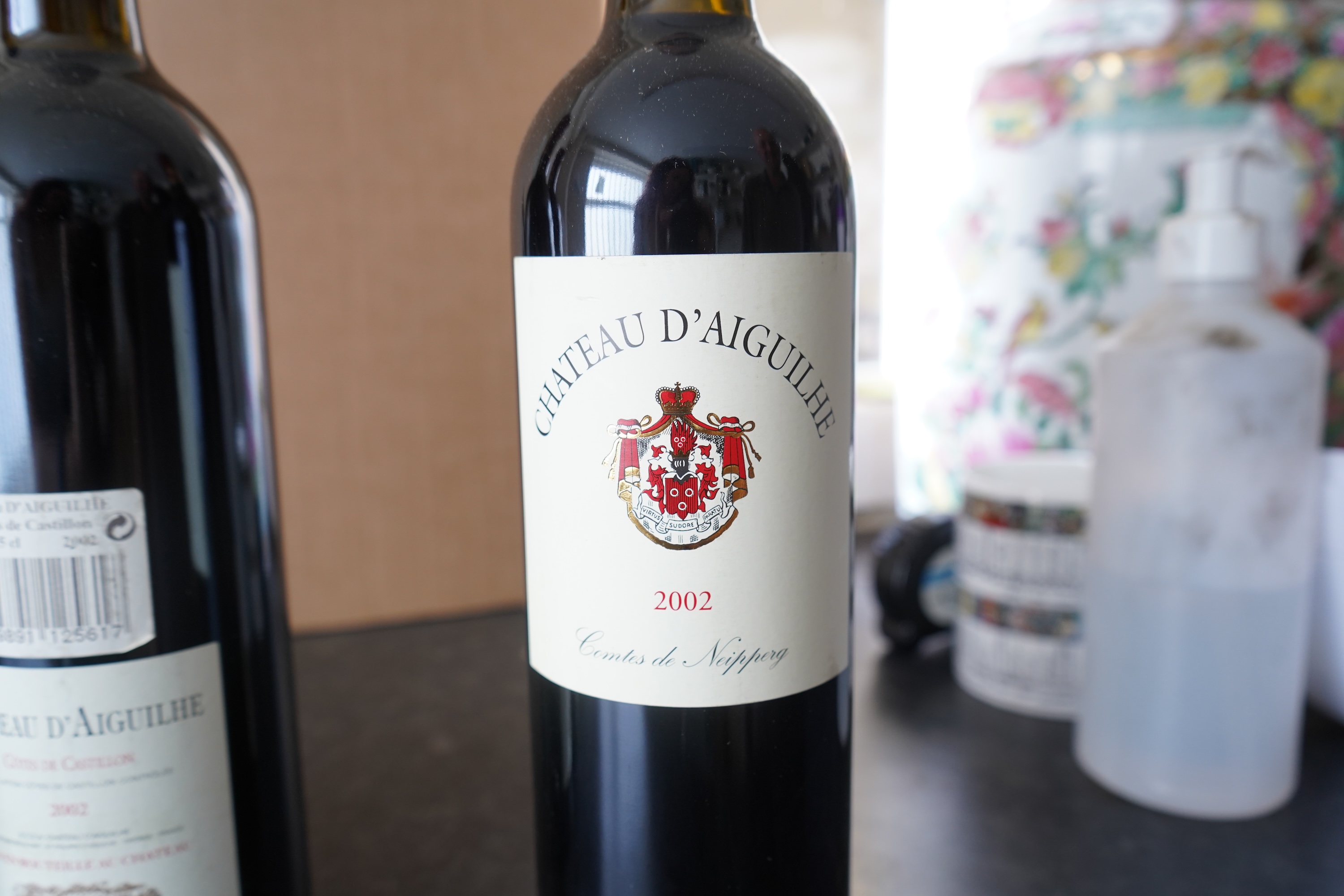 Nine bottles of 2002 Chateau d'Aiguilhe Castillon Cotes de Bordeaux, France